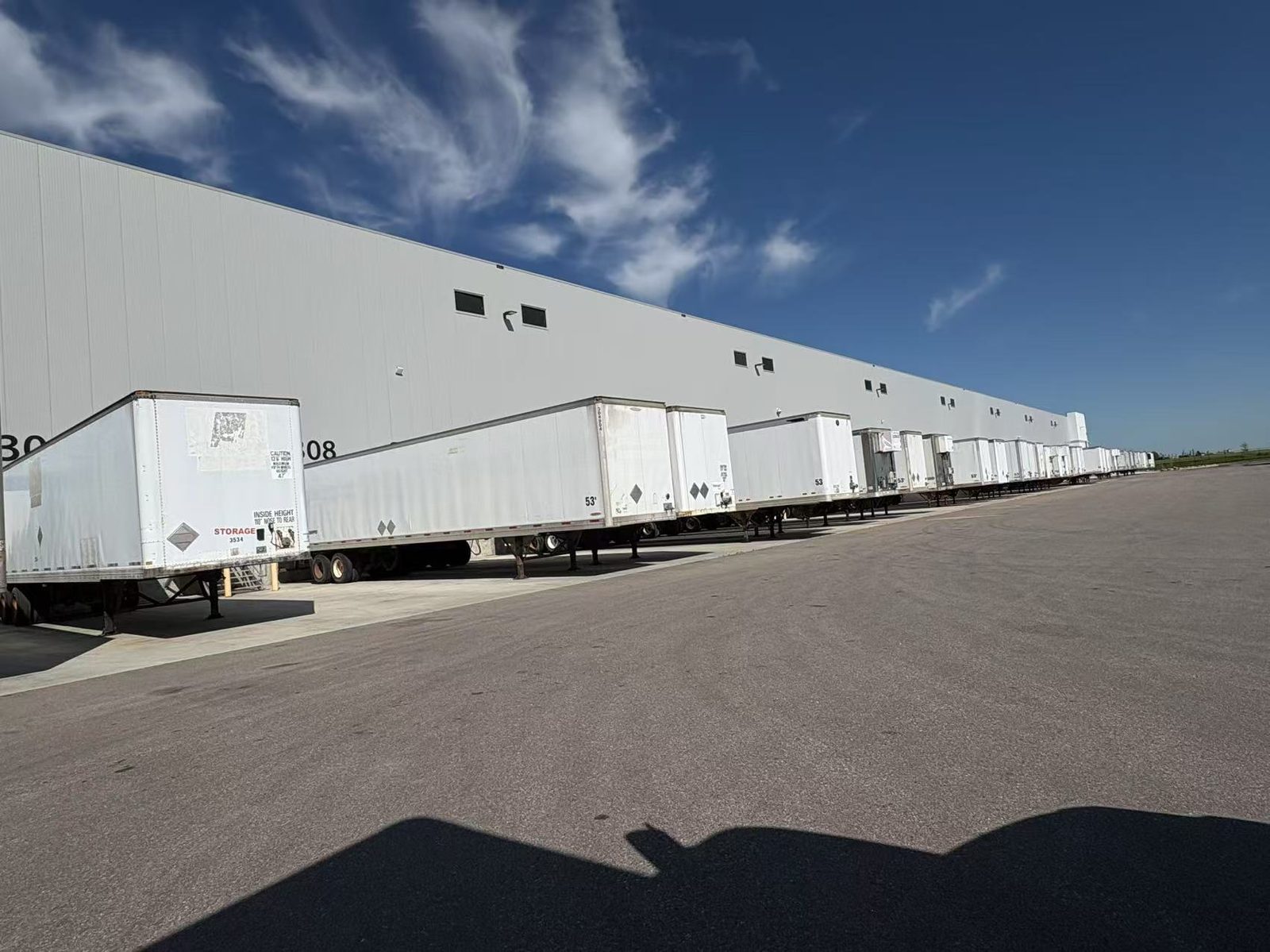 ESC Calgary warehouse dock with trailers