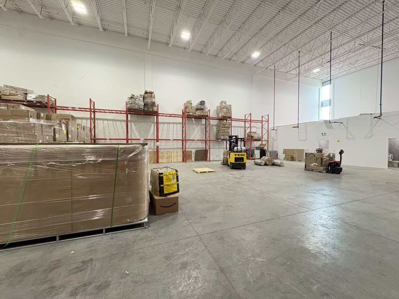 Warehouse interior with forklift